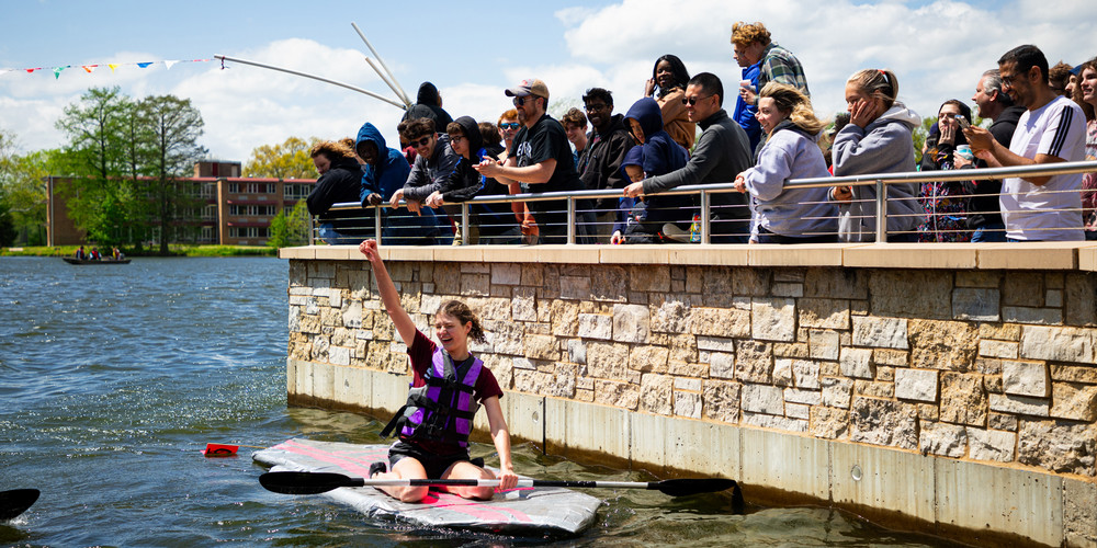 Group of SIU students watching the boat regatta on  Campus Lake