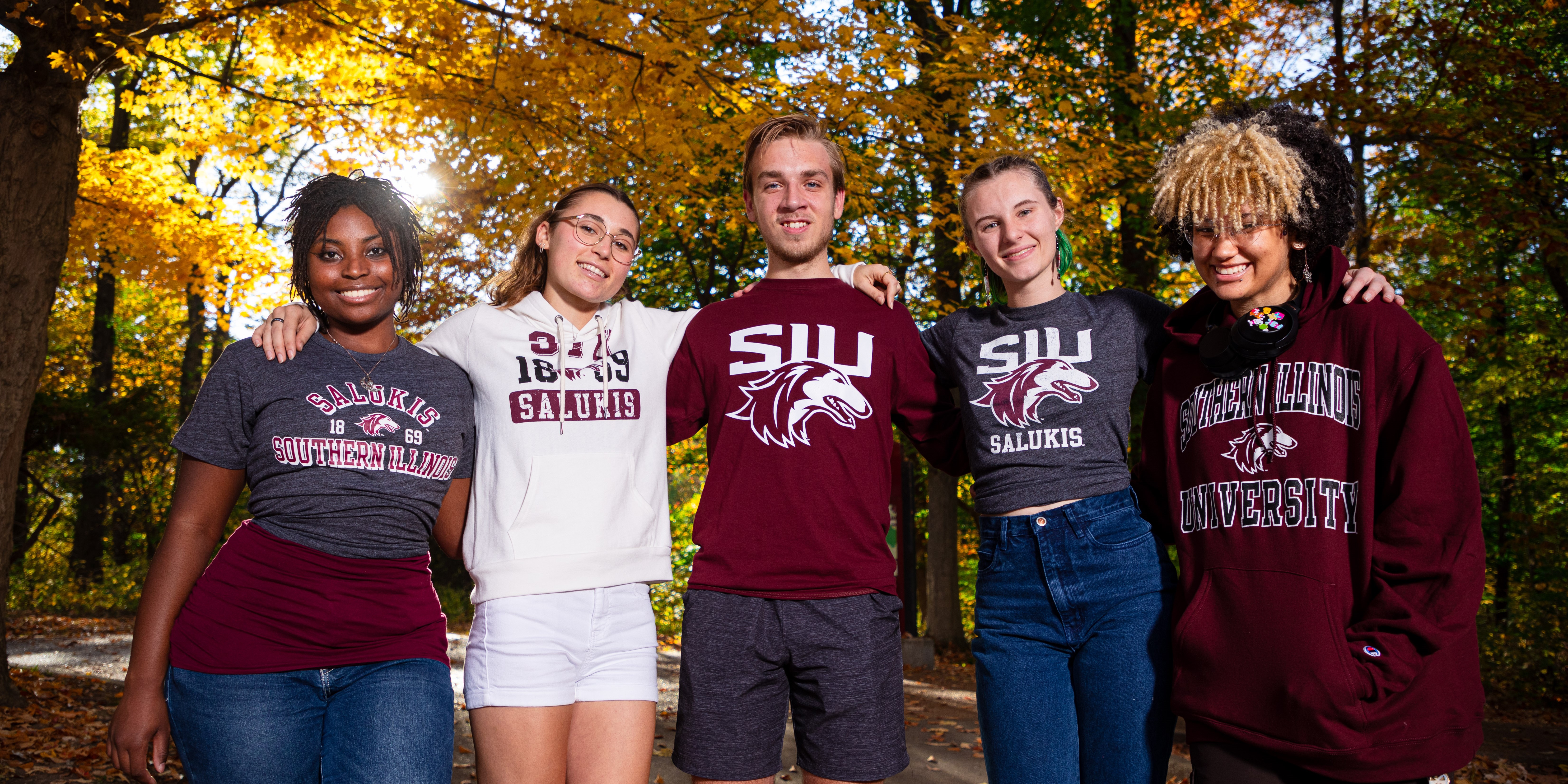 Students posing in the fall.